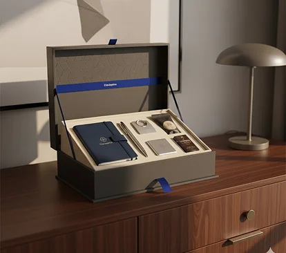 Premium corporate gift set containing a notebook, pen, and accessories in an elegant box